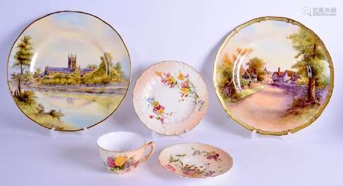 A ROYAL WORCESTER PLATE painted with a view of