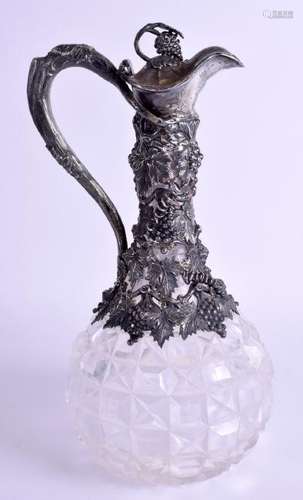 A GOOD VICTORIAN SILVER CLARET JUG overlaid in berries