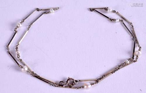 A PLATINUM AND PEARL NECKLACE. 34 cm long & weight 4