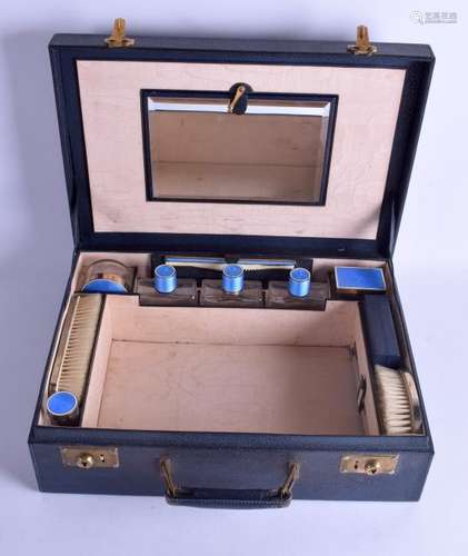 A LOVELY TRAVELLING SILVER AND ENAMEL VANITY CASE,