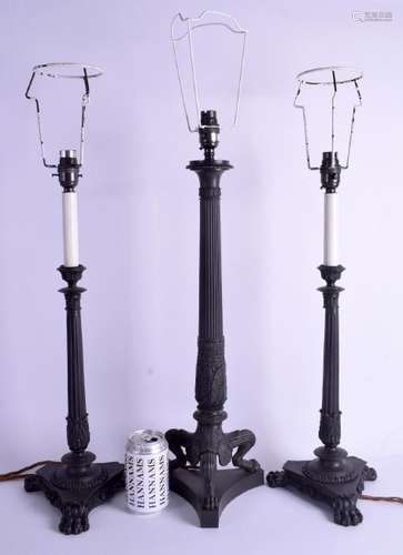 A SET OF THREE EMPIRE STYLE BRONZE CANDLESTICKS