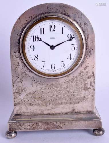 AN ART DECO ENGLISH SILVER CLOCK. 15 cm high.