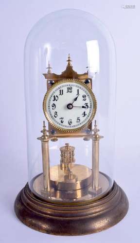 A VINTAGE BRASS ANNIVERSARY CLOCK. 26 cm high.