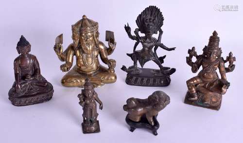 A RARE 19TH CENTURY INDIAN BRONZE FIGURE OF FOUR HEADED