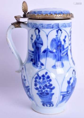 A 17TH CENTURY CHINESE BLUE AND WHITE TANKARD AND COVER