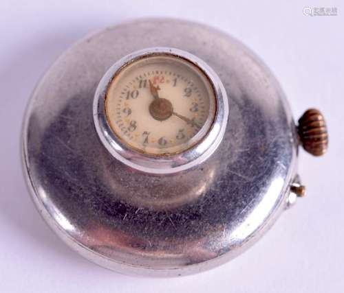 A RARE 19TH CENTURY SILVER LAPEL WATCH. 2.25 cm wide.