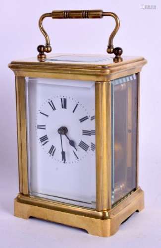 A LEATHER CASED FRENCH BRASS CARRIAGE CLOCK. 17 cm high