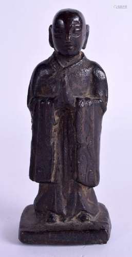 A 17TH CENTURY CHINESE BRONZE MING FIGURE OF A SCHOLAR