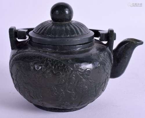 AN EARLY 20TH CENTURY CHINESE SPINACH JADE TEAPOT AND