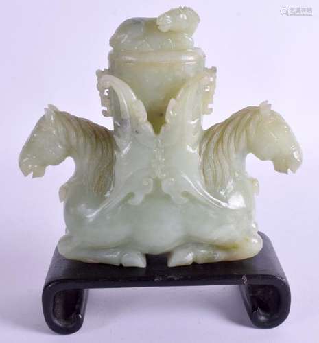 AN EARLY 20TH CENTURY CHINESE CARVED JADE HORSE CENSER