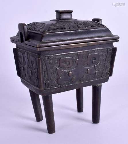 AN 18TH CENTURY CHINESE TWIN HANDLED BRONZE CENSER AND