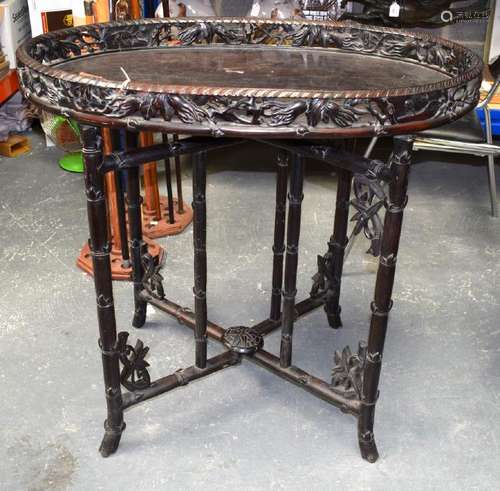 A 19TH CENTURY CHINESE HONGMU TRAY TOP TABLE ON STAND