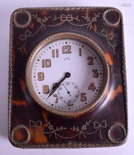 AN ANTIQUE TORTOISESHELL PIQUE INLAID TRAVELLING CLOCK