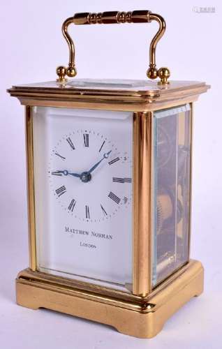 A MATTHEW NORMAN LONDON CARRIAGE CLOCK. 13 cm high.