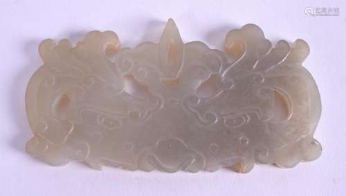 A 19TH CENTURY CHINESE CARVED MUTTON JADE ARCHAIC MASK