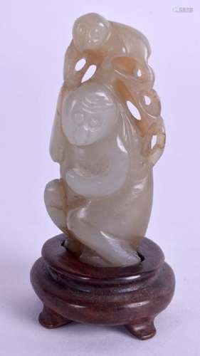 A 19TH CENTURY CHINESE CARVED GREEN JADE FIGURE OF TWO