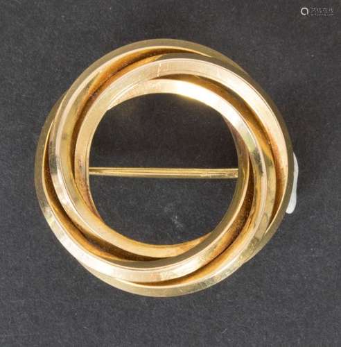 Brosche in Gold / An brooch in gold