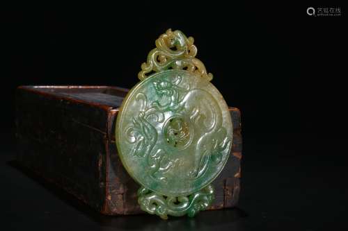 A Chinese Carved Jadeite Pendant