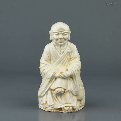 A Chinese Ding-Type Porcelain Buddha