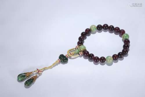 A Chinese Carved Tourmaline Prayers Beads