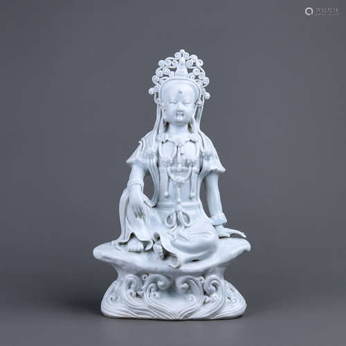 A Chinese White Glazed Porcelain Buddha