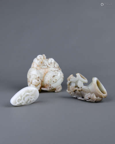 A Group of Chinese Republican Period Carved Jade Pendants and Decorations
