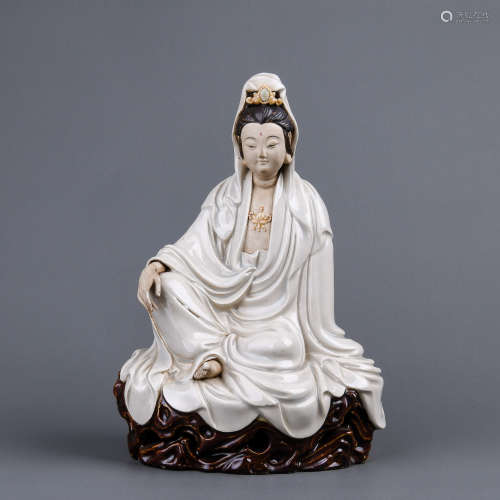 A Chinese Shiwan Porcelain Buddha
