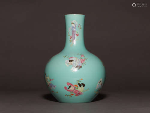 A STORY-TELLING FAMILLE ROSE VASE WITH QIANLONG MARKING