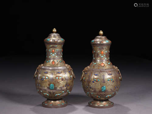 A PAIR OF SILVER VASES EMBEDED TURQUOISE STONE