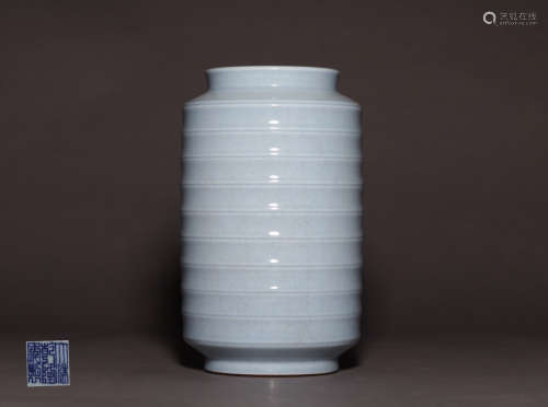 A PORCELAIN VASE WITH STRIPE PATTERNS AND QIANLONG MARKING