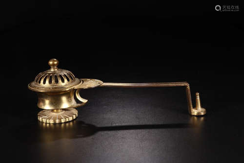 A GILT BRONZE ORNAMENT