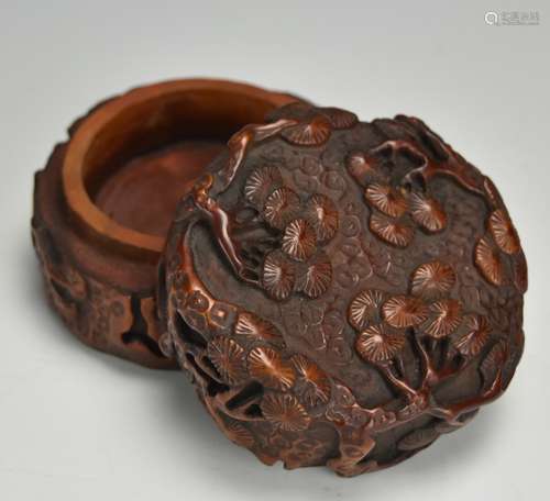 A Carved Circular Pine Bough Box, 20th C.