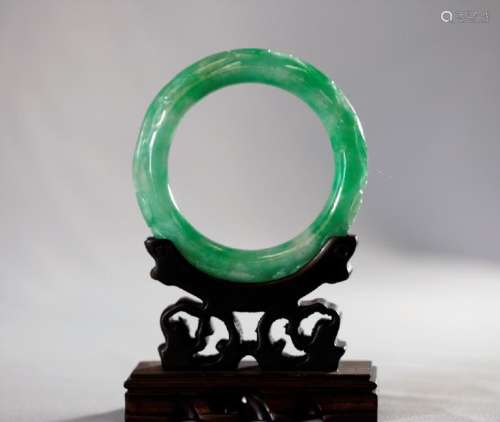 Chinese Qing Dynasty green jadeite carved bangle