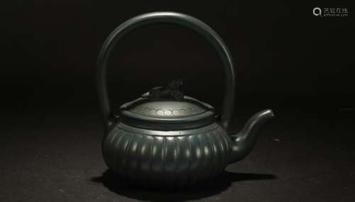 A Chinese High-handled Estate Tea Pot Display