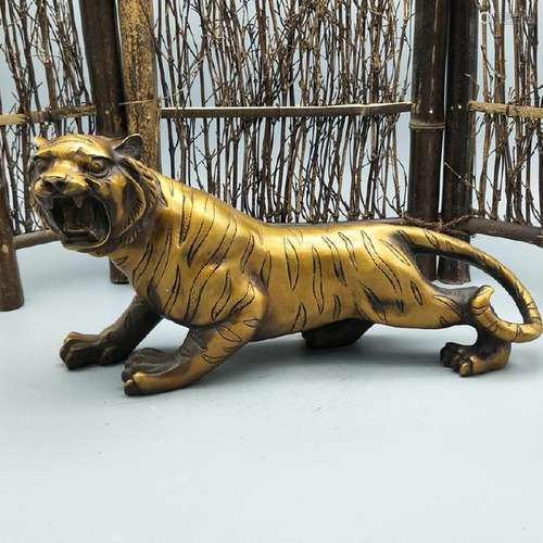 A GILT BRONZE TIGER STATUE QING DYNASTY.