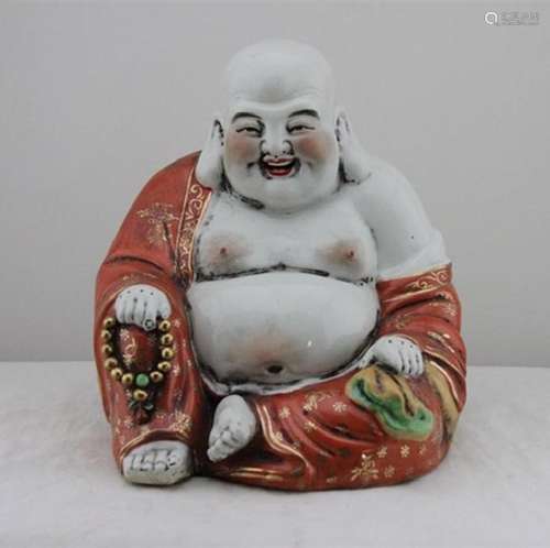 A PORCELAIN ENAMEL BUDDHA FIGURE QING DYNASTY.