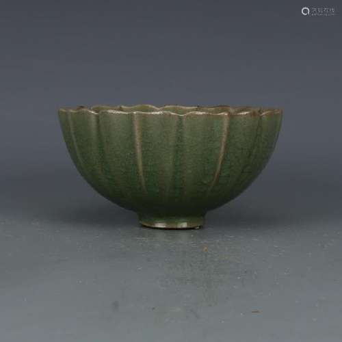 A CELADON MELLOW SHAPED BOWL MING DYNASTY.