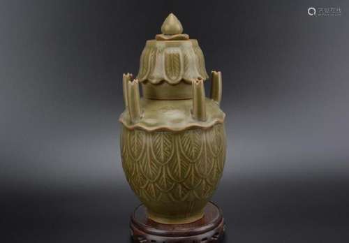 A CELADON FIVE-TUBE JAR MING DYNASTY.