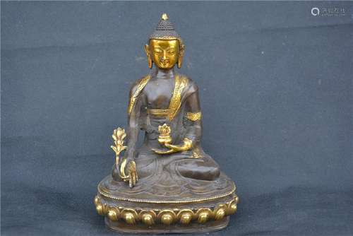 A GILT BRONZE SHAKYAMUNI BUDDHA FIGURE MING DYNASTY.