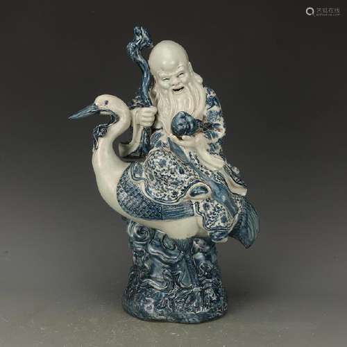 A BLUE & WHITE EASTERN SANTA STATUE QING DYNASTY.