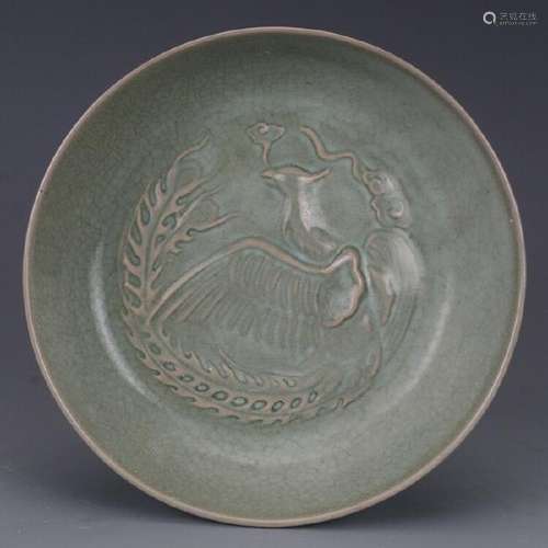 A CELADON phOENIX PLATE MING DYNASTY.