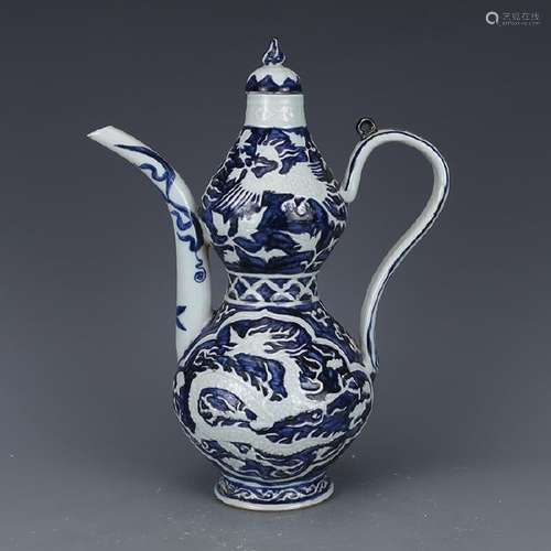 A BLUE & WHITE DRAGON & PHOENIX TEAPOT YUAN DYNASTY.