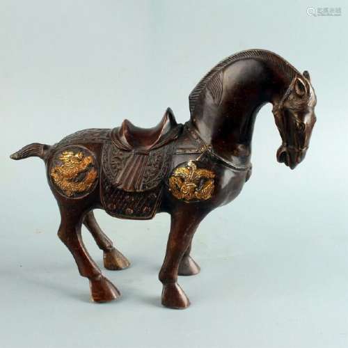 A BRONZE GILDED HORSE STATUE MING DYNASTY.