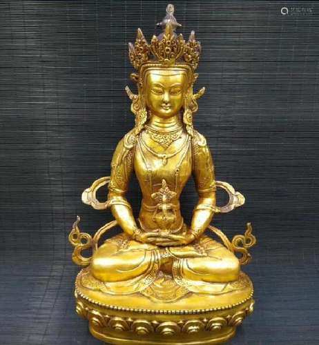 A GILT BRONZE BUDDHA FIGURE MING DYNASTY.