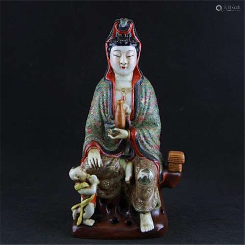 A PORCELAIN ENAMEL BUDDHA FIGURE QING DYNASTY.