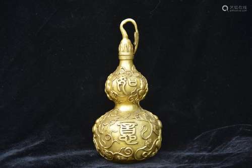 A GILT BRONZE DOUBLE GOURD BOTTLE MING DYNASTY.