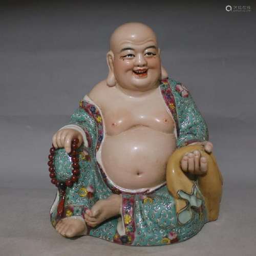 A PORCELAIN ENAMEL BUDDHA FIGURE QING DYNASTY.