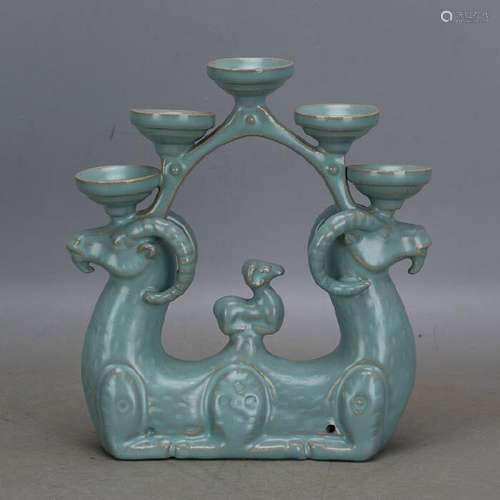 A SKY BLUE PORCELAIN SHEEP LAMP STAND MING DYNASTY.