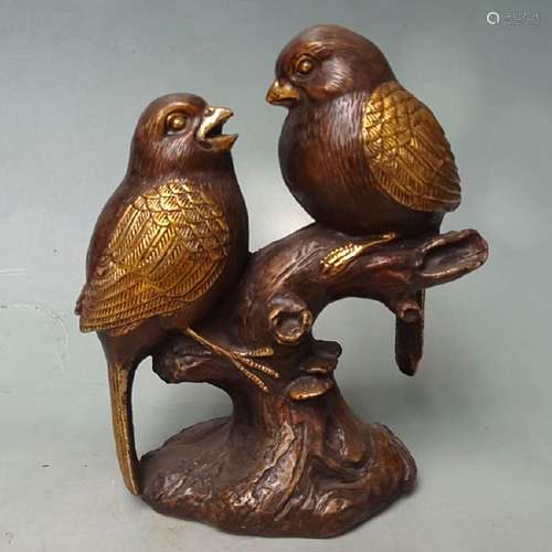 A BRONZE GILDED TWIN BIRD STATUE QING DYNASTY.