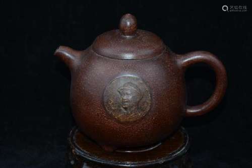 A BROWN WARRIOR ZISHA TEAPOT YIXING.